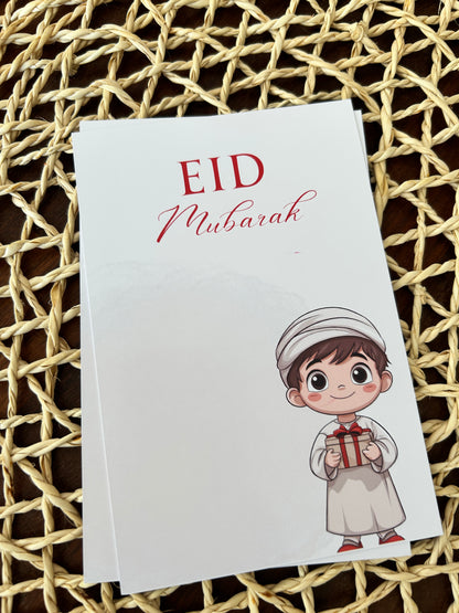 EID Mubarak card with a cartoon character on a woven surface
