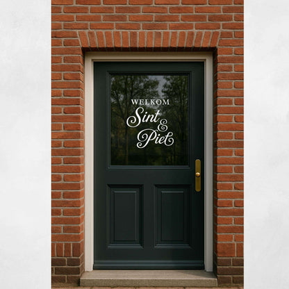 Black door with 'WELKOM Sint & Piet' text on a glass